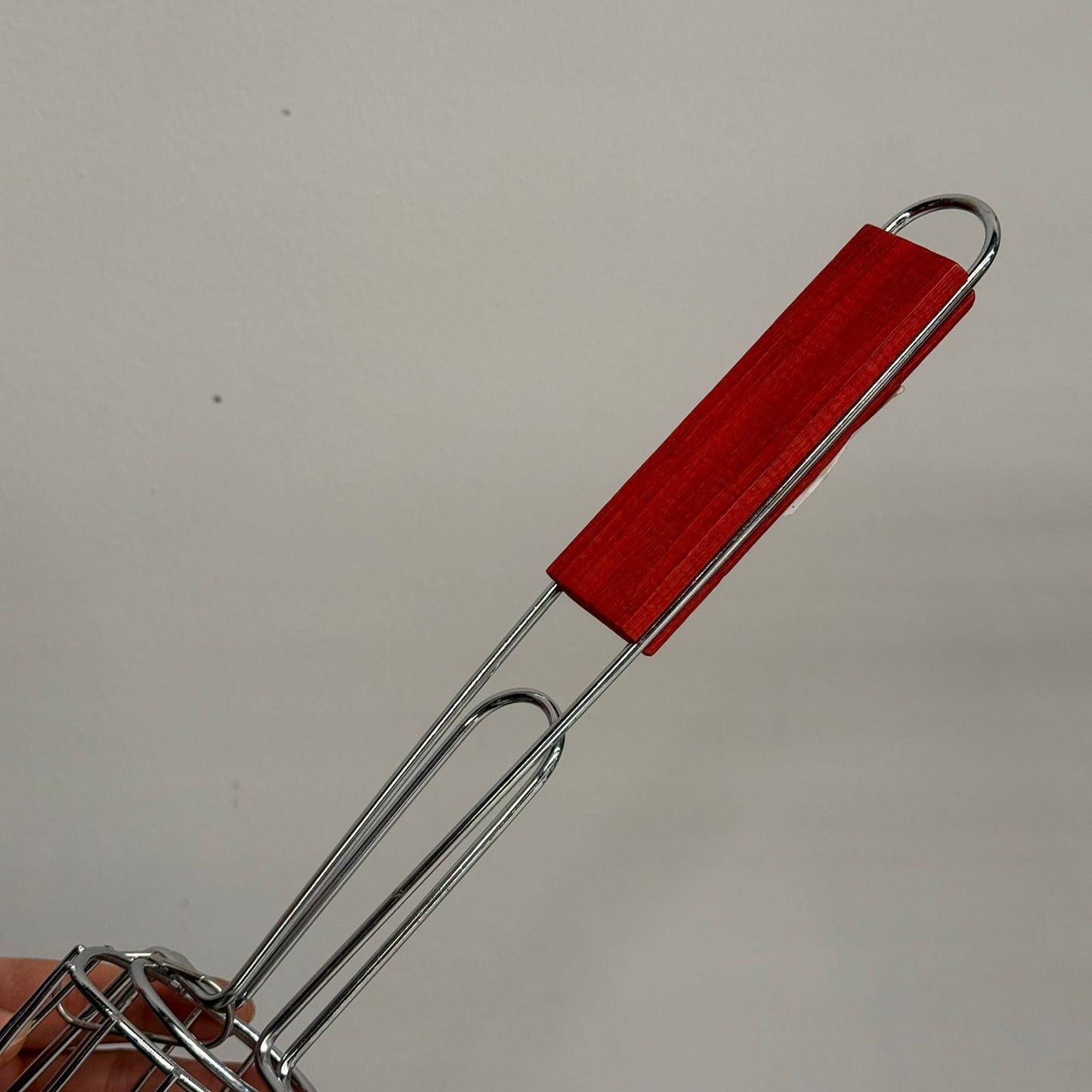 سەبەتەی برژاندن بە دەستە دار