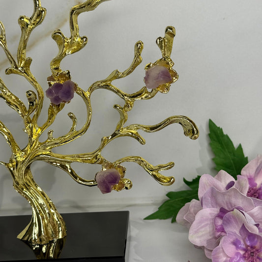 دارێکی زێڕینی مۆدێرن بە گوڵی بەردین