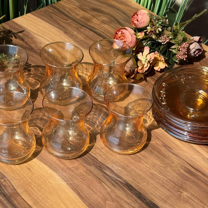 Elegant Curved Glass Tea Set with Matching Saucers
