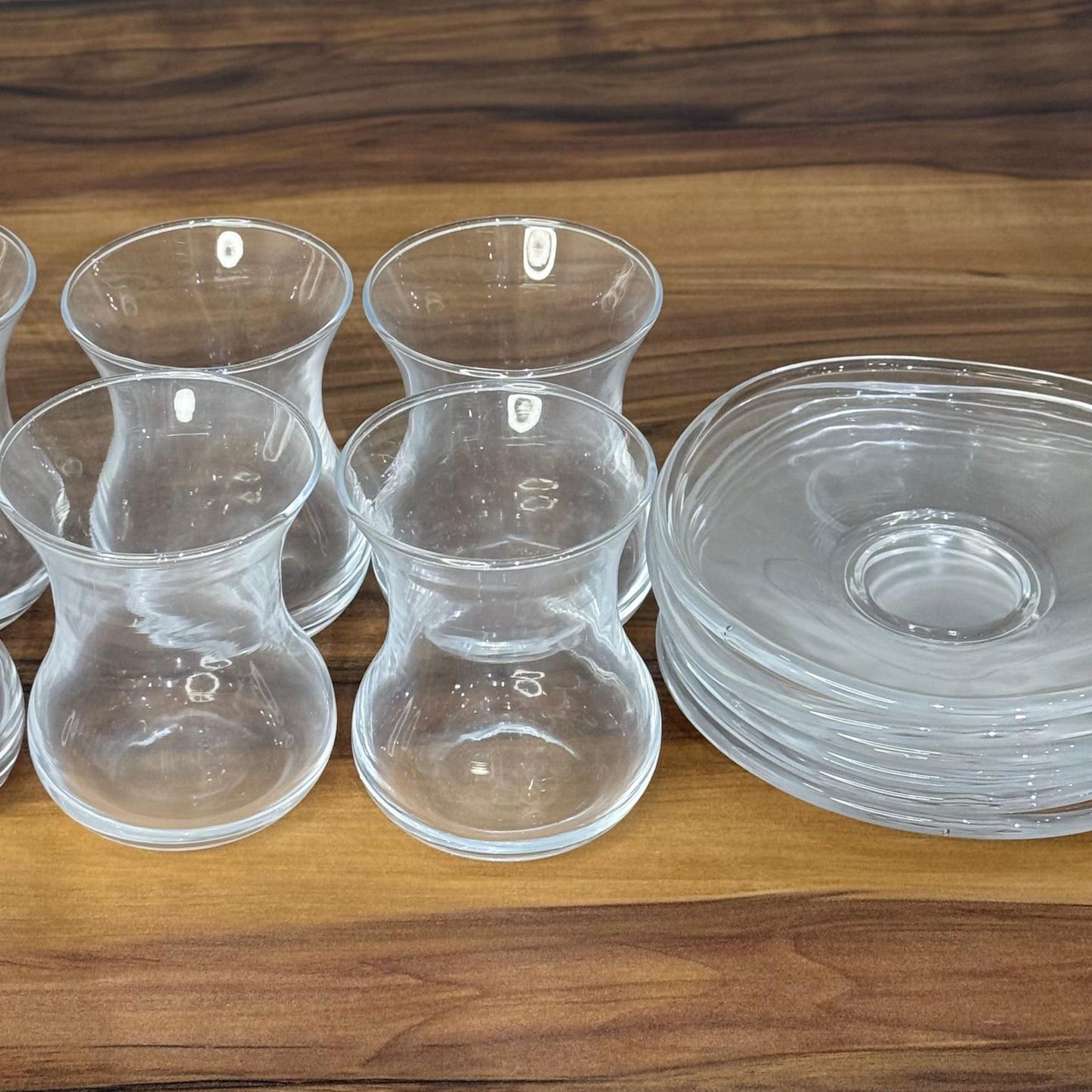 Elegant Curved Glass Tea Set with Matching Saucers