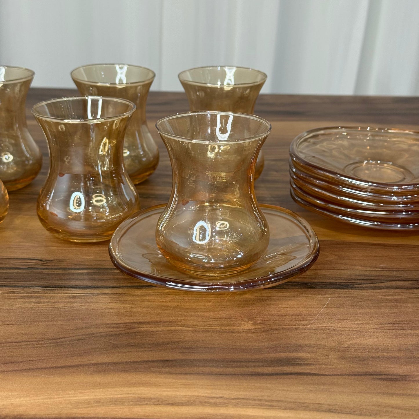 Elegant Curved Glass Tea Set with Matching Saucers