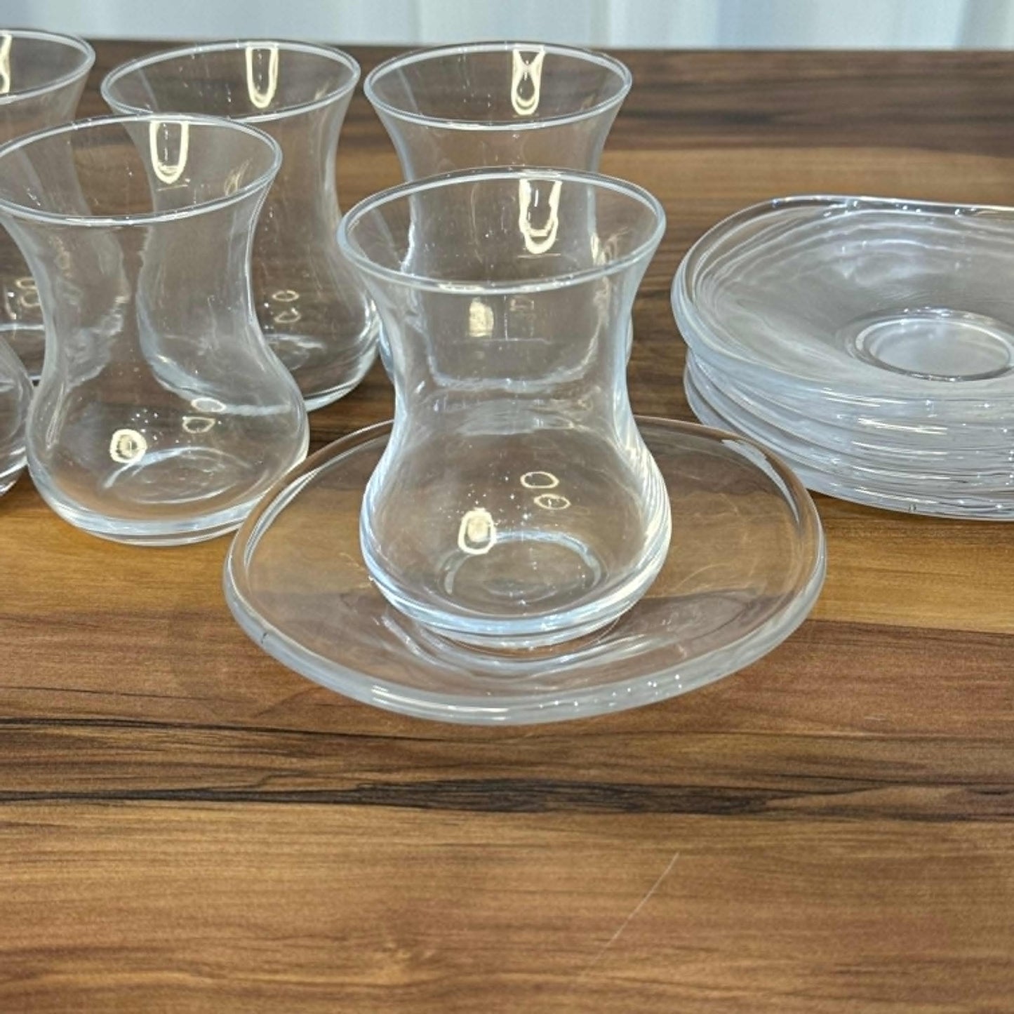 Elegant Curved Glass Tea Set with Matching Saucers