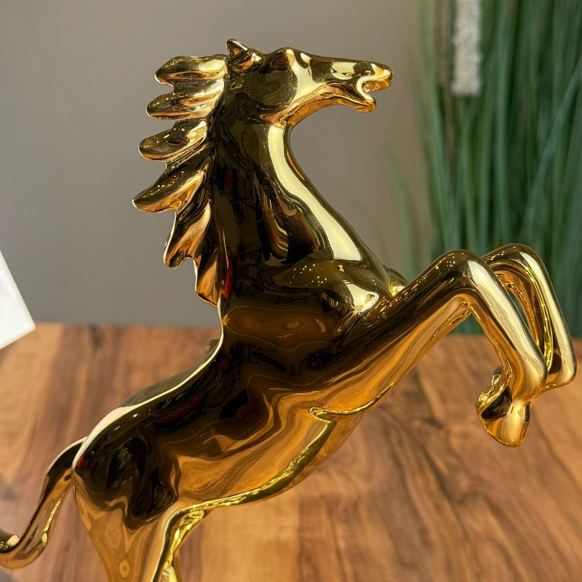 Golden Ceramic Horse Figurine on Pedestal
