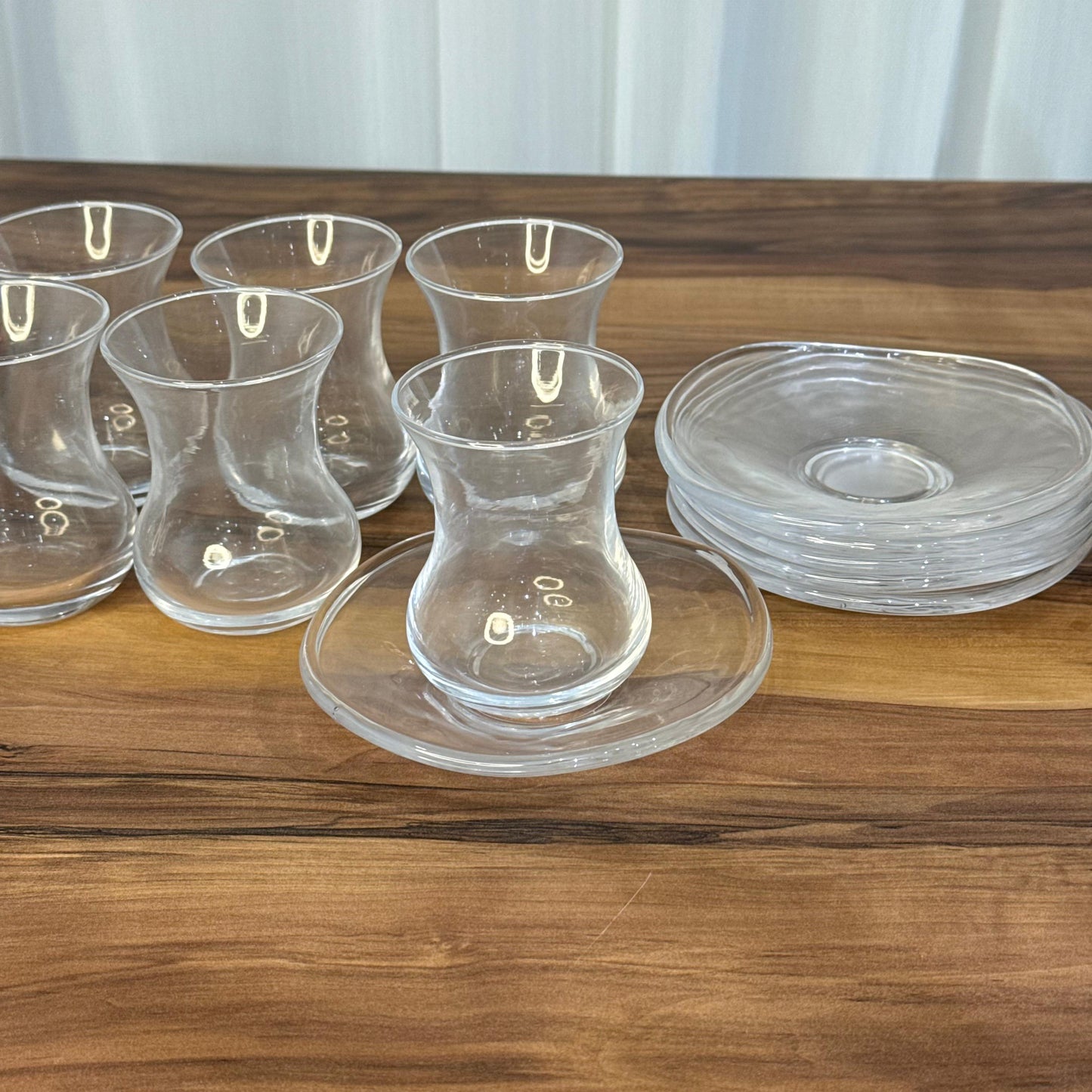 Elegant Curved Glass Tea Set with Matching Saucers