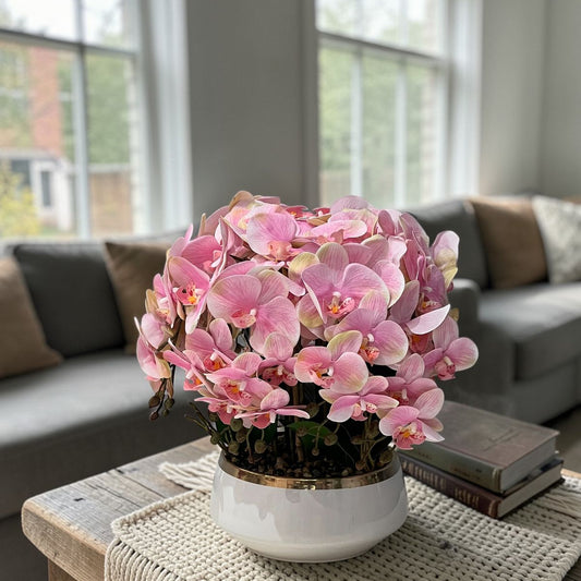 زهرة أوركيد صناعية أنيقة مع مزهرية مزخرفة