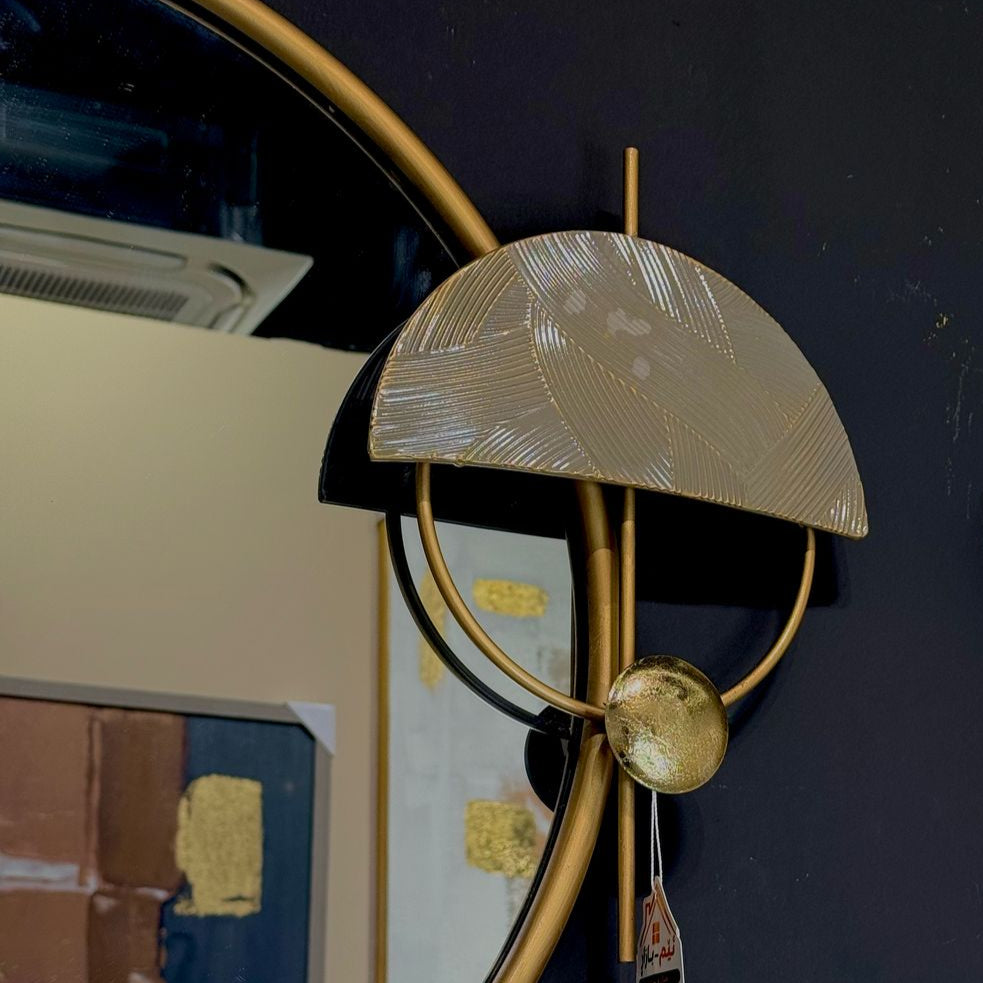 ديكور جداري معدني دائري ومرآة